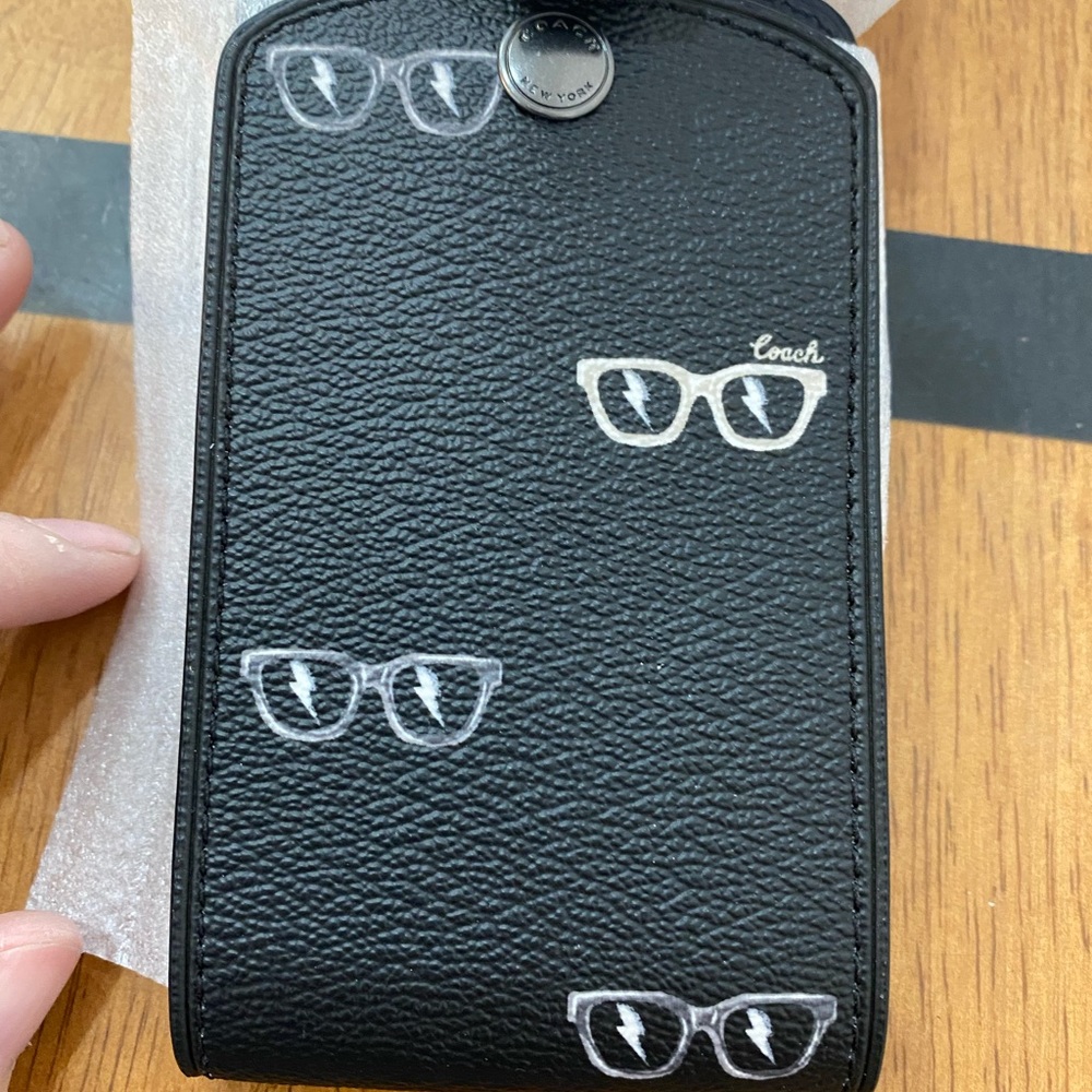 Coach sunglasses luggage tag
